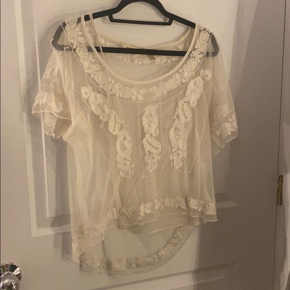 White flowy top